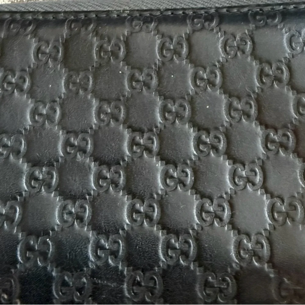 Gucci Black GG Embossed Zip-Around Coin Wallet with Star Charm